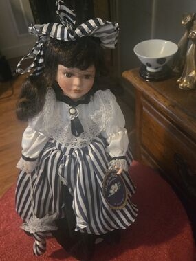 Vintage-Style Decorative Porcelain Doll in Black and White Striped Dress